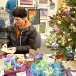 Artist and art teacher Julie Lagace displayed some of her hand-marbled glass ornaments at the holiday fair. (Carol Ladwig/Staff Photo)