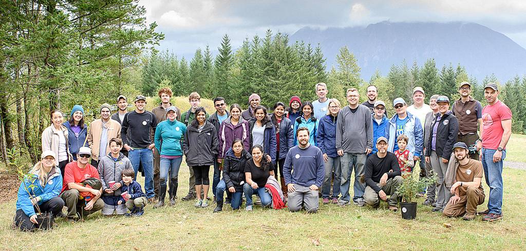 Some 60 community volunteers helping to remove invasive plants and plant native species at Snoqualmie Point Park and the Meadowbrook Slough at the citys first ever Green Snoqualmie Day, Oct. 7, take a break for a group photo. (Photo courtesy of Jim Avery)