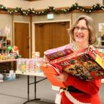 Holiday spirit headquarters: Giving Tree program wraps up with two-day shopping event at North Bend LDS church