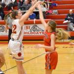 Mount Si High School girls basketball team co-captain Sam Smith shoots from the three-point line in the teams Dec. 20 match with Juanita. Mount Si won the game 46-36. (Photo courtesy of Charles Samuelson)