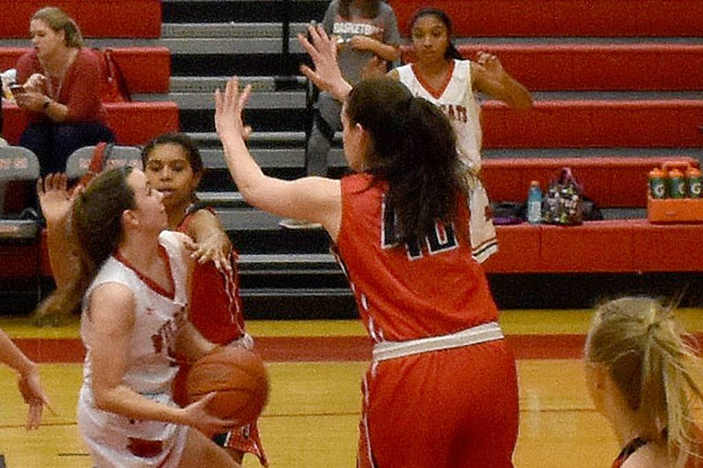 Jenae Usselman charges for the basket in a Dec. 20 game against Juanita. (Photo courtesy of Charles Samuelson)