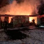 A garage fire on 473rd Avenue SE in North Bend, while firefighters work to extinguish the flames. (Photo courtesy of Eastside Fire and Rescue)