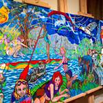 The new mural installed in the Opstad Elementary School gym, pictured here in artist Kristin Lockwoods studio, depicts outdoor activities and invites students to explore the outdoors. (Courtesy Photo)