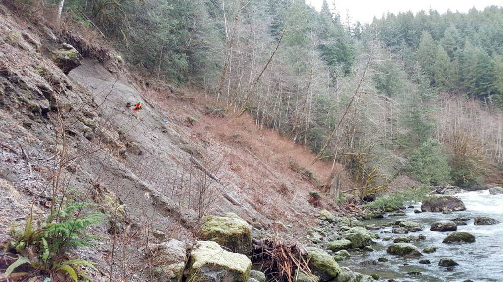 A city engineer stands by the site of the recent landslide at Canyon Springs. (Courtesy Photo)