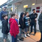 Snoqualmie Valley Food Bank Executive Director Heidi Dukich gives the Wildcat Baseball Club a tour of the food bank and a briefing on who the food bank serves Jan. 8 when the team delivered a donation from its recently completed food drive. (Courtesy Photo)