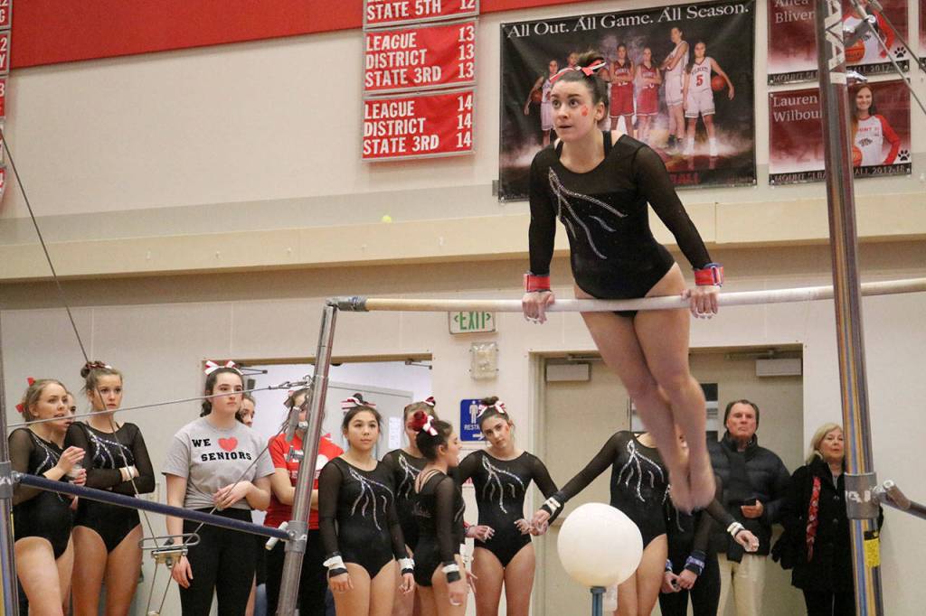 Gabrielle Recchi begins her bars routine at Mount Sis match against Eastlake on senior night, Jan. 18. (Evan Pappas/Staff Photo)