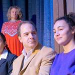 Jake, played by René Schuchter, center, talks with both versions of his daughter, Molly, at age 12, played by Bella Branson, left, and at age 21, played by Rachel Friedley, right, while his sister Karen, played by Brynne Garman, back, watches. (Courtesy Photo)