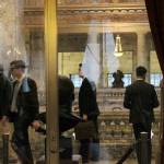 University of Washington students walk to their meeting in the state reception room in the capital building in Olympia. Photo by Taylor McAvoy
