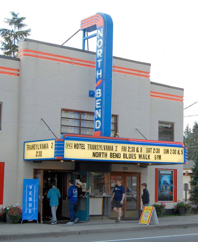 The North Bend Theatre marquee promotes the annual Blues Walk event in 2015. (File Photo)