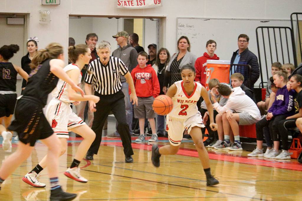 Nitika Kumar gets around her opponent with the help of a teammate. (Evan Pappas/Staff Photo)
