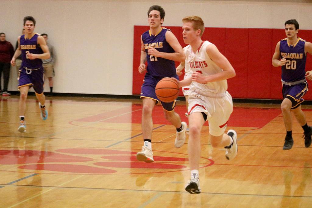 Jabe Mullins breaks away form his opponents and scores in the first half. (Evan Pappas/Staff Photo)