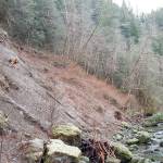 A city engineer stands by the site of the recent landslide at Canyon Springs. (Courtesy Photo)