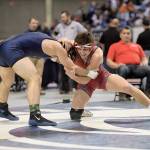 Conor Holt faces off against his opponent at the State Championships. (Photo courtesy of Calder Productions)