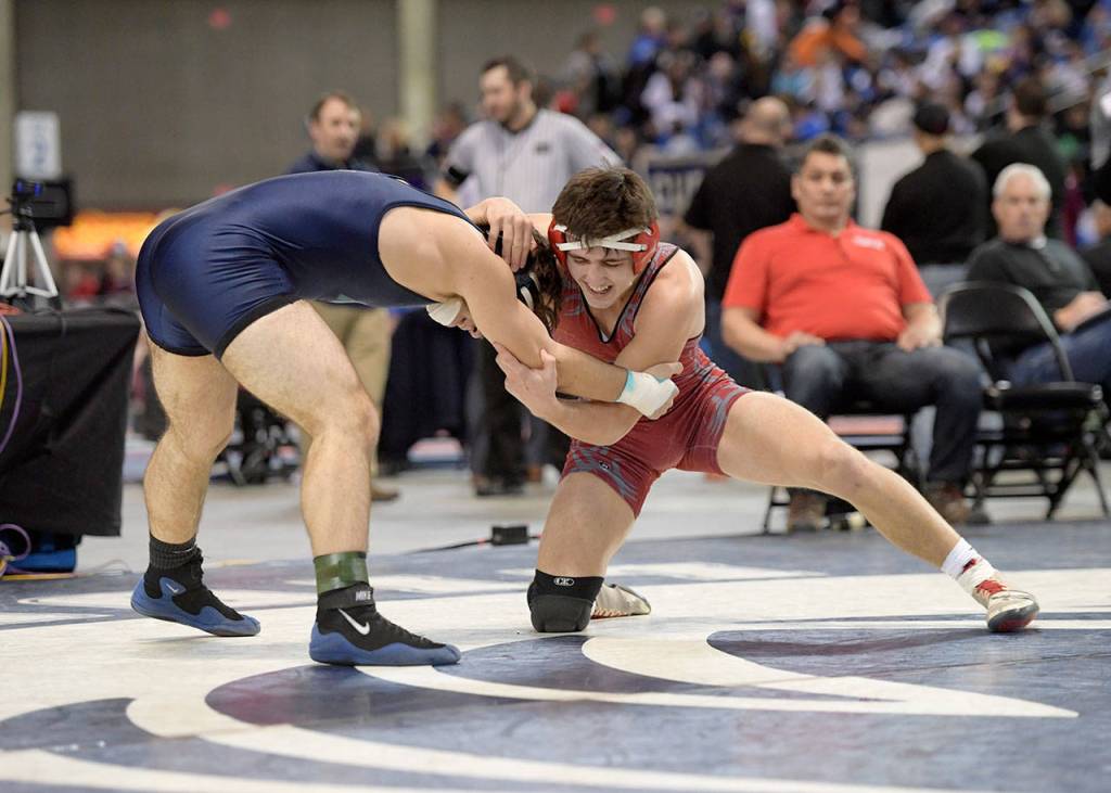 Conor Holt faces off against his opponent at the State Championships. (Photo courtesy of Calder Productions)