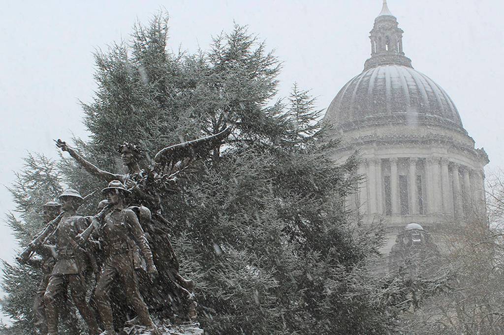 A winter view of the Capitol in Olympia, where lawmakers have two weeks left in the legislative session. (Taylor McAvoy/WNPA Olympia Bureau)