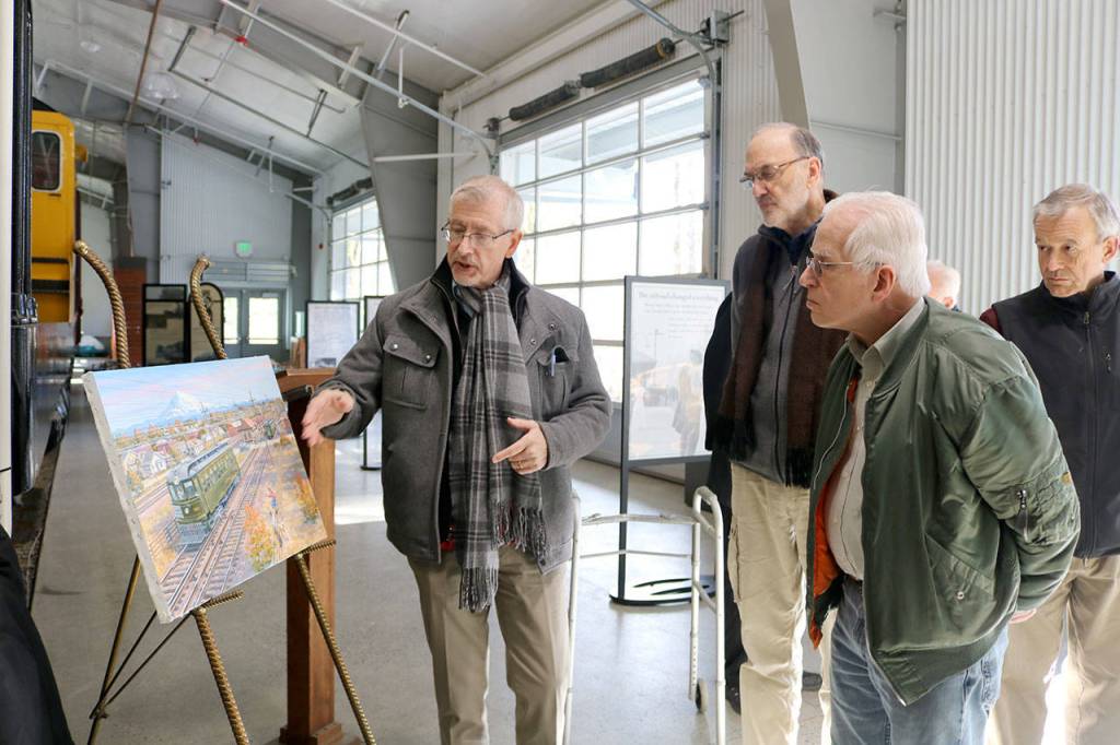Thorpe explains elements of his panting to attendees of the event. (Evan Pappas/Staff Photo)