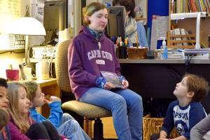 Author at 12, Jay Dilger donates books to alma mater, Opstad Elementary