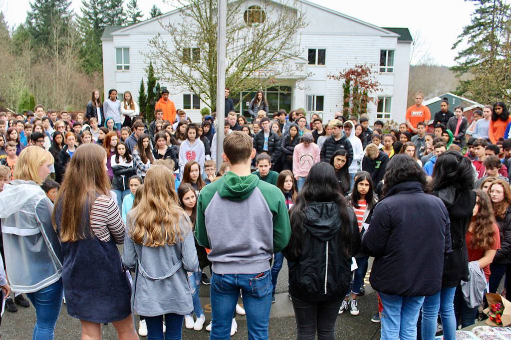 Overlake students participate in a walkout at the Redmond school, calling on legislators and Congress to enact common sense gun control laws. Photo courtesy of Susan Messier, The Overlake School