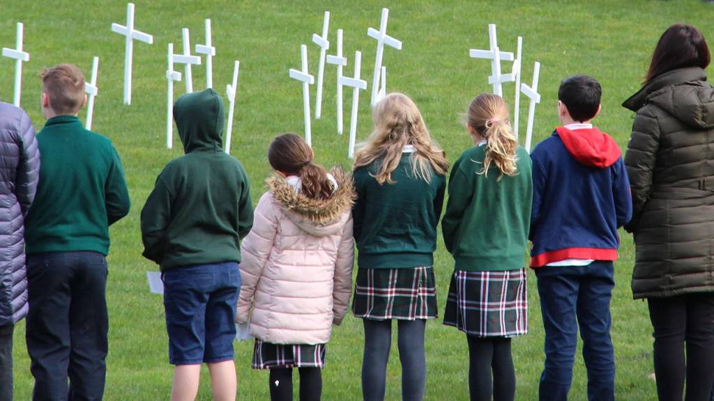 Students at St. Monica School, a private Catholic school based in Mercer Island, prayed for the 17 victims of the Parkland school shooting. Photo courtesy of Krista Pittiglio