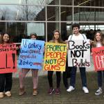 Students at Bellevue High School held signs during a walkout calling on legislators and Congress to enact common sense gun control laws. Photo courtesy of Bellevue School District