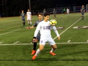 Shaun Scott, staff photo                                Issaquah Eagles forward Jacob Barsher controls the ball while being guarded by Mount Sis Inaki McCarthy in the first half of play. Issaquah defeated Mount Si 2-0 in overtime on March 24 at Gary Moore Stadium in Issaquah.