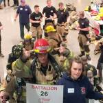 Firefighters on the climb - note escalators were not running at the time. Photo courtesy of the City of Snoqualmie