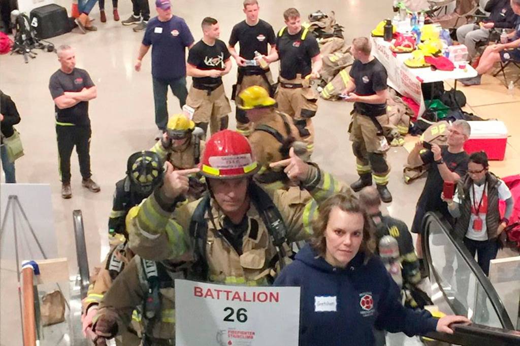 Firefighters on the climb - note escalators were not running at the time. Photo courtesy of the City of Snoqualmie