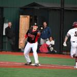 Photo courtesy of Calder Productions                                The Mount Si Wildcats defeated the Eastlake Wolves 9-5 in a battle between KingCo 4A teams on April 9. Mount Si improved its overall record to 7-5 with the win. Mount Si first infielder Michael Collins hauls in a toss from the infield, getting Eastlake runner Dalton Chandler out at first base.