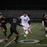 Photo courtesy of Don Borin/Stop Action Photography                                Mount Si Wildcats senior midfielder Kyle Hunter, center, is surrounded by Issaquah Eagles players in a matchup between KingCo 4A rivals on April 13 at Mount Si High School. Issaquah defeated Mount Si 2-0.