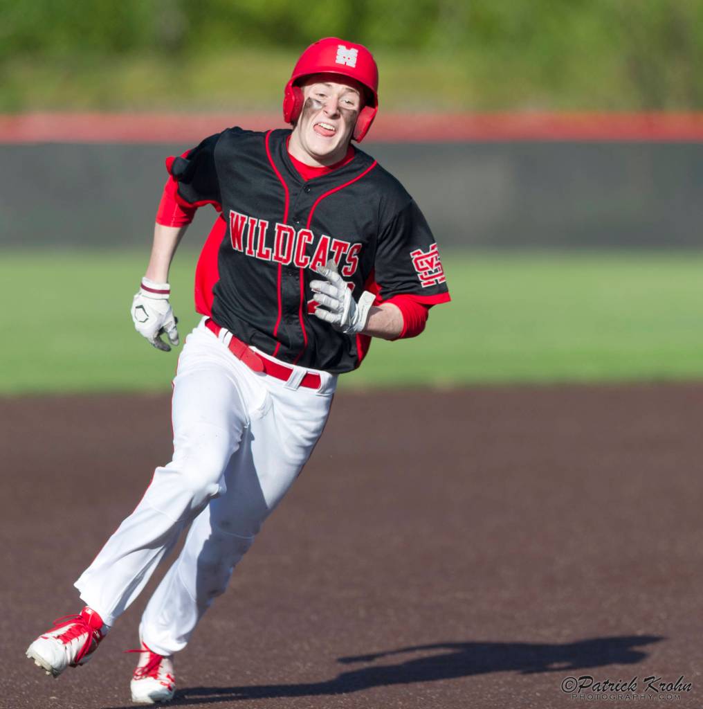 Photo courtesy of Patrick Krohn/Patrick Krohn Photography                                Mount Si Wildcats senior Logan Van Campen hustles to home-plate, scoring a run for his team in the top of the seventh inning. The Issaquah Eagles defeated the Mount Si Wildcats 8-4 in a loser-out, KingCo 4A playoff game on May 4 at Bannerwood Park in Bellevue.
