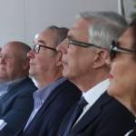 Overlake CEO J. Michael Marsh, center left, Bellevue mayor John Chelminiak, center, and FutureCare Campaign chair York Harris, center left, sit in the front row during a May 9 groundbreaking ceremony at Overlake Medical Center in Bellevue. Aaron Kunkler/Staff photo