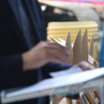 A row of stacked shovels sits behind Bellevue mayor John Chelminiak as he gave a speech at a May 9 groundbreaking ceremony at Overlake Medical Center. The expansion will be the largest in the hospitals 58-year history. Aaron Kunkler/Staff photo