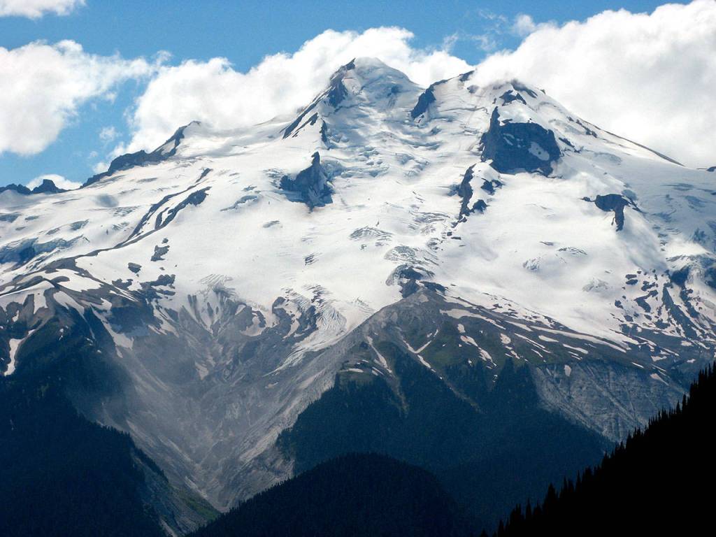 Glacier Peak as seen from the east, from Buck Creek Pass, in July 2007. (Wenatchee World file)                                Glacier Peak viewed from the east from Buck Creek Pass in July 2007. Photo by Rob Ollikainen/Wenatchee World