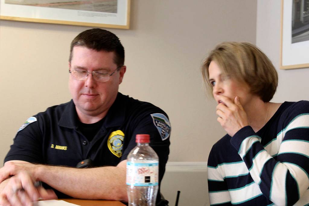 Langley Chief of Police David Marks sat with his girlfriend, Tara Hoflack, during Mondays city council meeting. Photo by Patricia Guthrie/Whidbey News Group