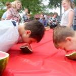 The watermelon eating contest draws a huge crowd as kids of all ages try their best to win. Evan Pappas/Staff Photo