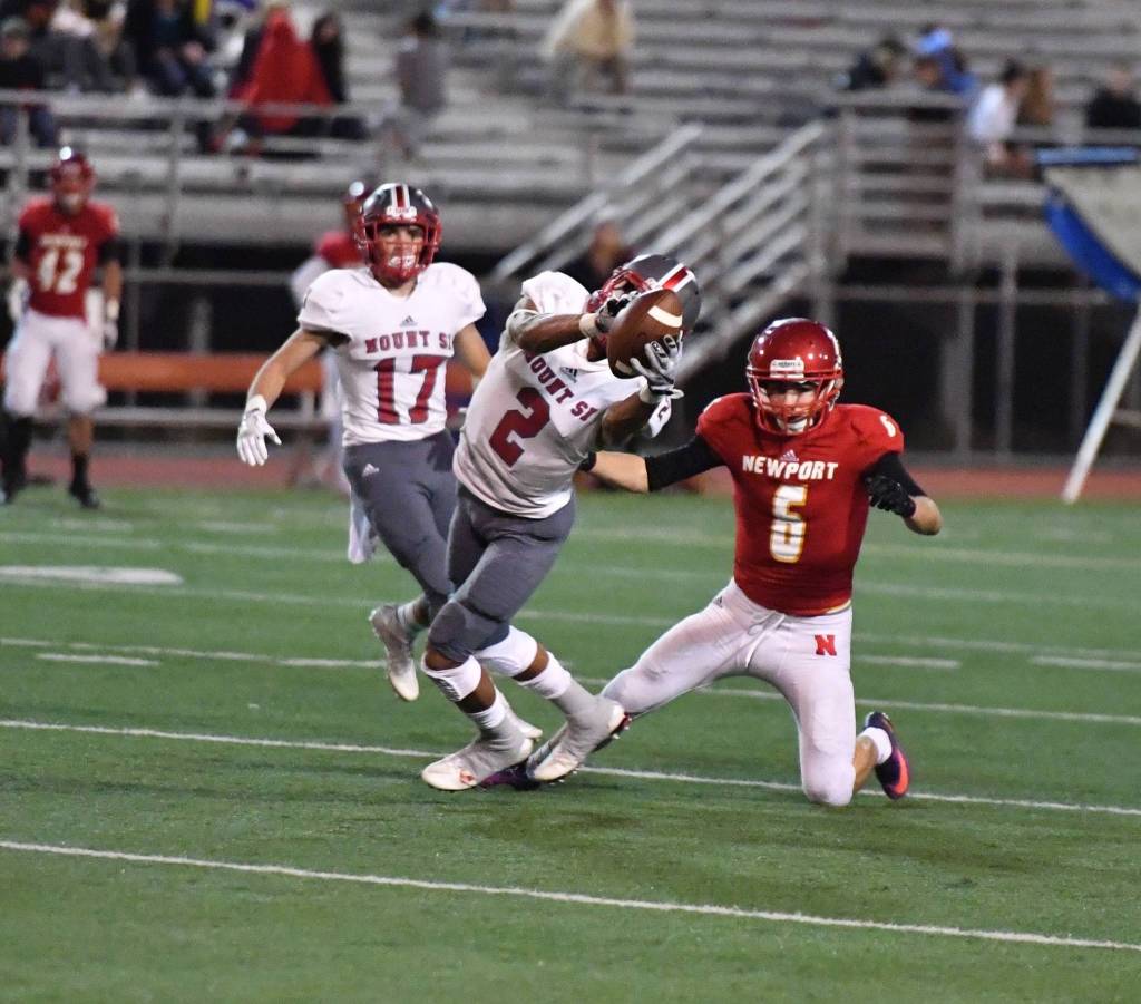 Jesiah Irish snags an interception in 4A KingCo action last season. Photo courtesy of Calder Productions