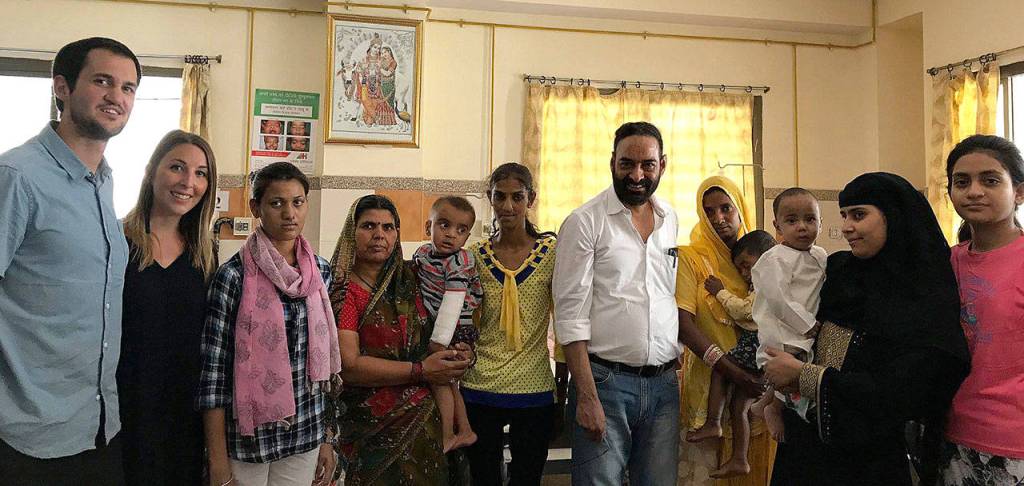 Jake and Madison Leland visit a Smile Train surgeon and his patients in Jaipur, India. Photo courtesy of Jake and Madison Leland.