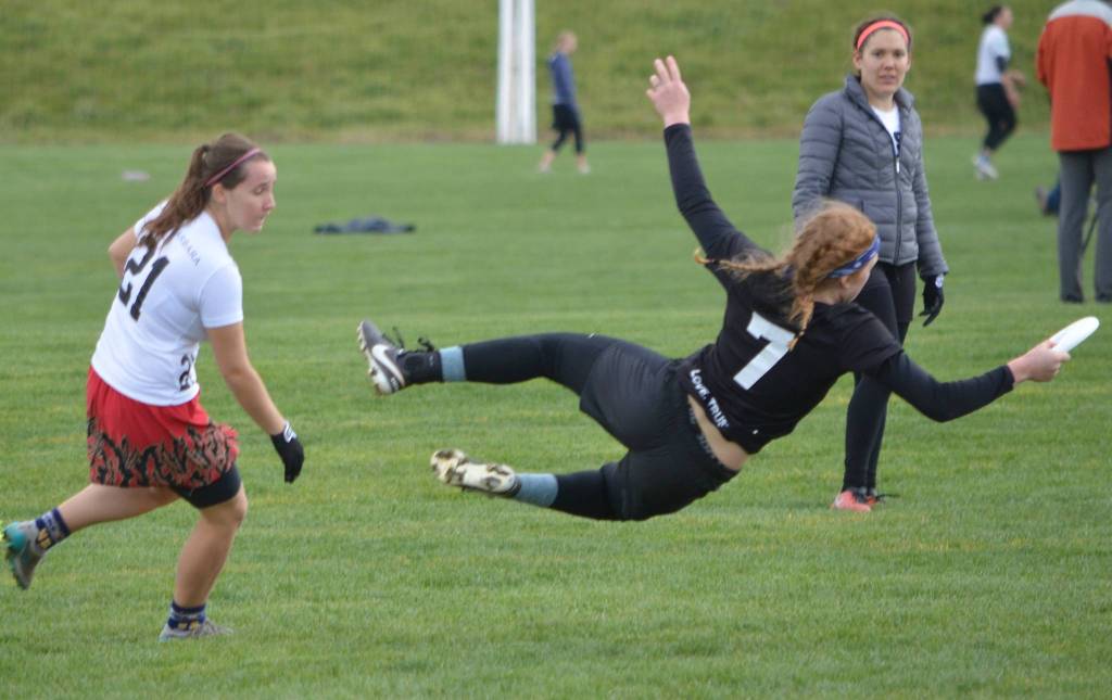 Mount Si High alumnus Nellie Joselyn dives for the ultimate disc for the Western Washington University Chaos. Below, Joselyn shown visiting Ísafjördur, Iceland, this summer. Courtesy photos