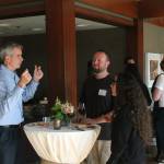 Snoqualmie mayor Matt Larson talks with other guests at the Salish Lodge and Spa grand reopening. The lodge underwent a $13 million remodel which was recently finished. Aaron Kunkler/Staff photo