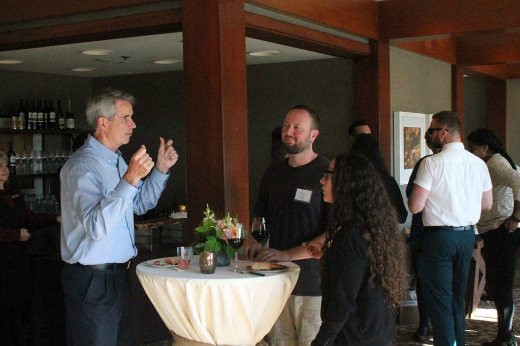 Snoqualmie mayor Matt Larson talks with other guests at the Salish Lodge and Spa grand reopening. The lodge underwent a $13 million remodel which was recently finished. Aaron Kunkler/Staff photo