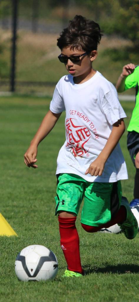 Cooper Reed controls the ball at camp. Andy Nystrom / staff photo