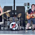 LocoMotive played the Bendigo Stage Saturday at the Block Party. Pictured from left are Bella Mariani, Ethan Horn and Ryan Horn. Carol Ladwig/Staff Photo