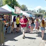 Volunteers with Night on a Dark Trail give a creepy welcome to people at the Block Party. Carol Ladwig/Staff Photo