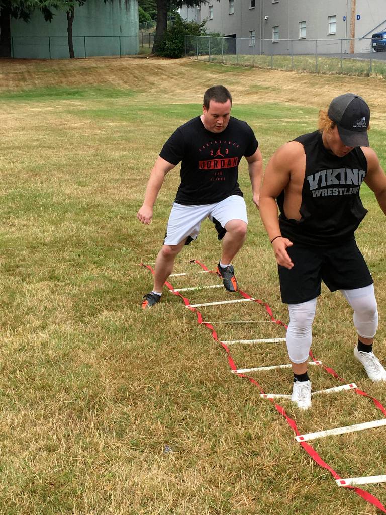 Sound Publishing sportswriter Shaun Scott focuses while doing a footwork drill on July 19.                                Photo courtesy of Todd Green