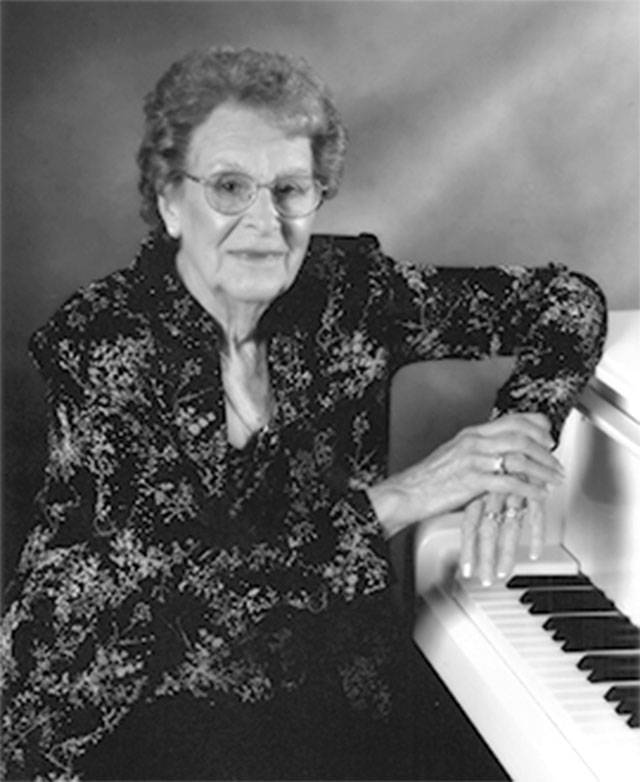 MAISIE M. PURSER DAVIS