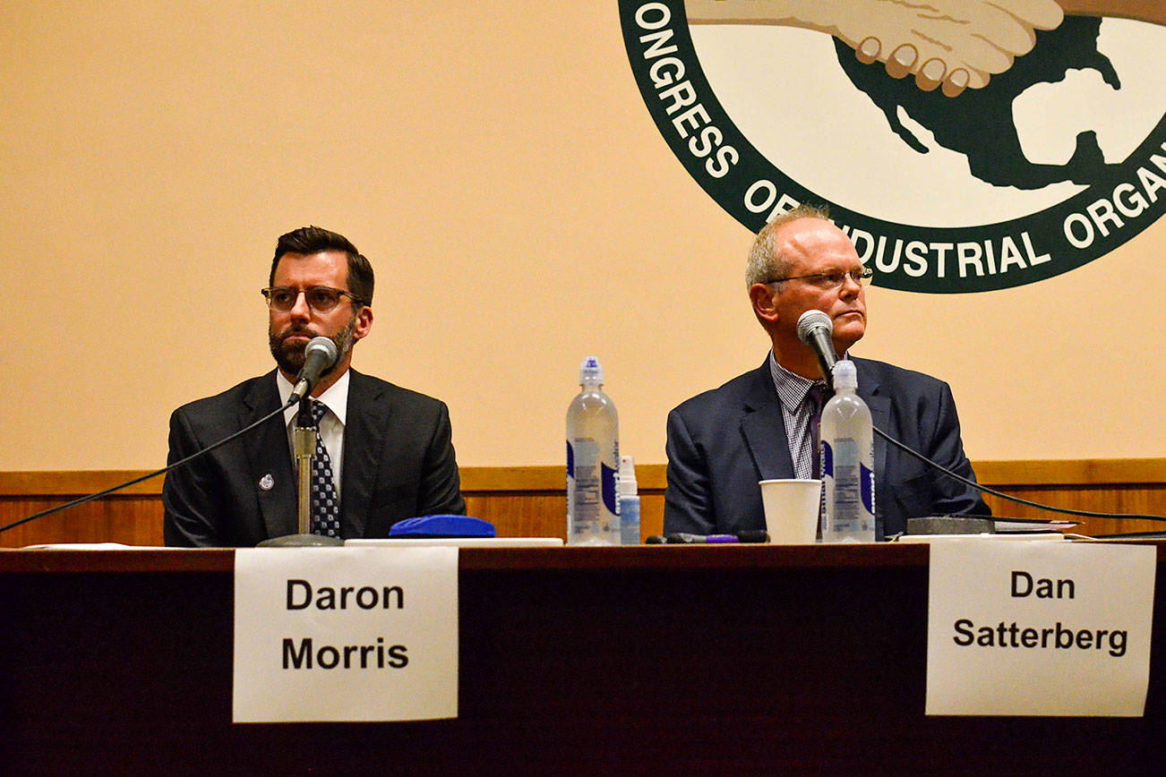 Former public defender Daron Morris criticized King County Prosecutor Dan Satterberg on issues like bail at a Aug. 15 forum at the MLK Labor Temple in Seattle. Photo by Josh Kelety