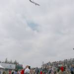 Everyone grabs their phones to get a picture of the low-flying plane. Evan Pappas/Staff Photo