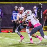 Mount Si Wildcats senior quarterback Cale Millen, left, hands off to running back Cole Norah in the first half of play. Norah had three rushing touchdowns in Mount Sis 38-6 victory against Issaquah on Oct. 5 at Gary Moore Stadium in Issaquah. Photo courtesy of Don Borin/Stop Action Photography