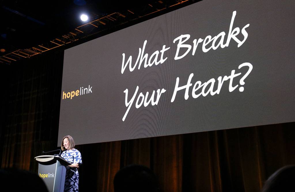 Hopelink CEO Lauren Thomas asks the attendees at Hopelinks 23rd annual Reaching Out luncheon to think about what breaks their heart. Katie Metzger/staff photo