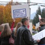 SVSD teachers, secretaries, SVEA and PSE members, and other supporters picket in front of Snoqualmie Valley City Hall before the Oct. 23 school board meeting for living wages of district secretaries. Madison Miller/staff photo.